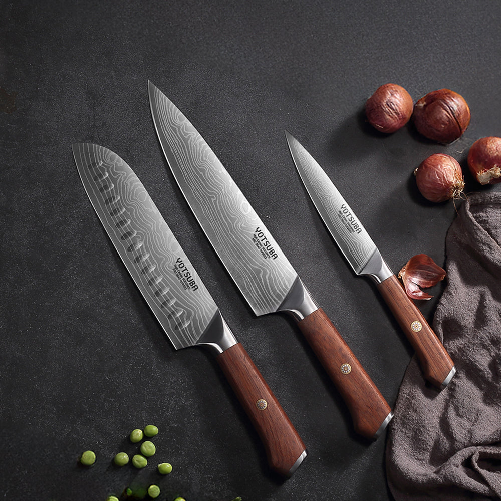 Yotsuba chef kitchen knife sets with wooden handles displayed on dark backgroundshop_this_look_AVdw3f