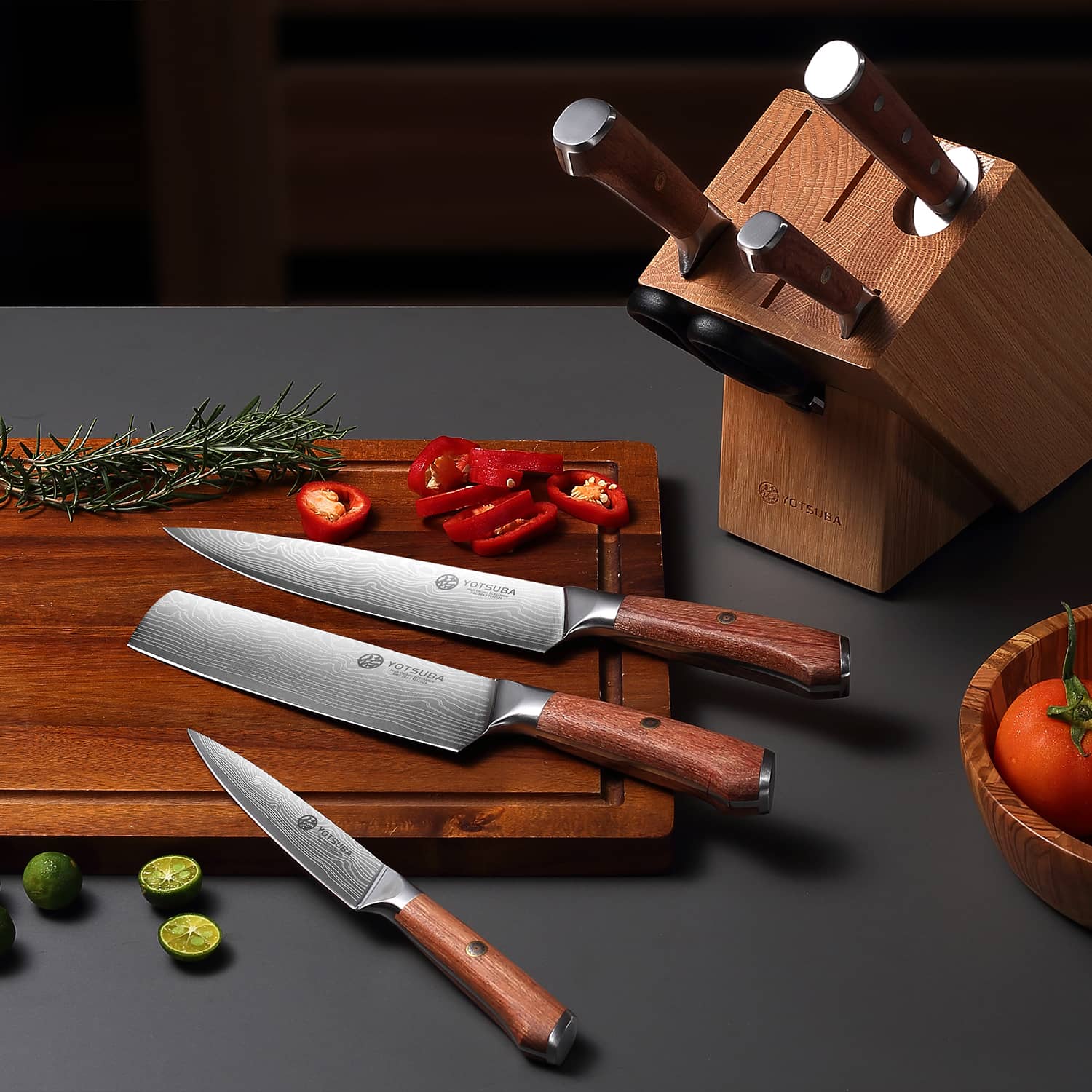 Yotsuba Damascus kitchen knife sets with wooden handles displayed on dark backgroundshop_this_look_EcLGgQ