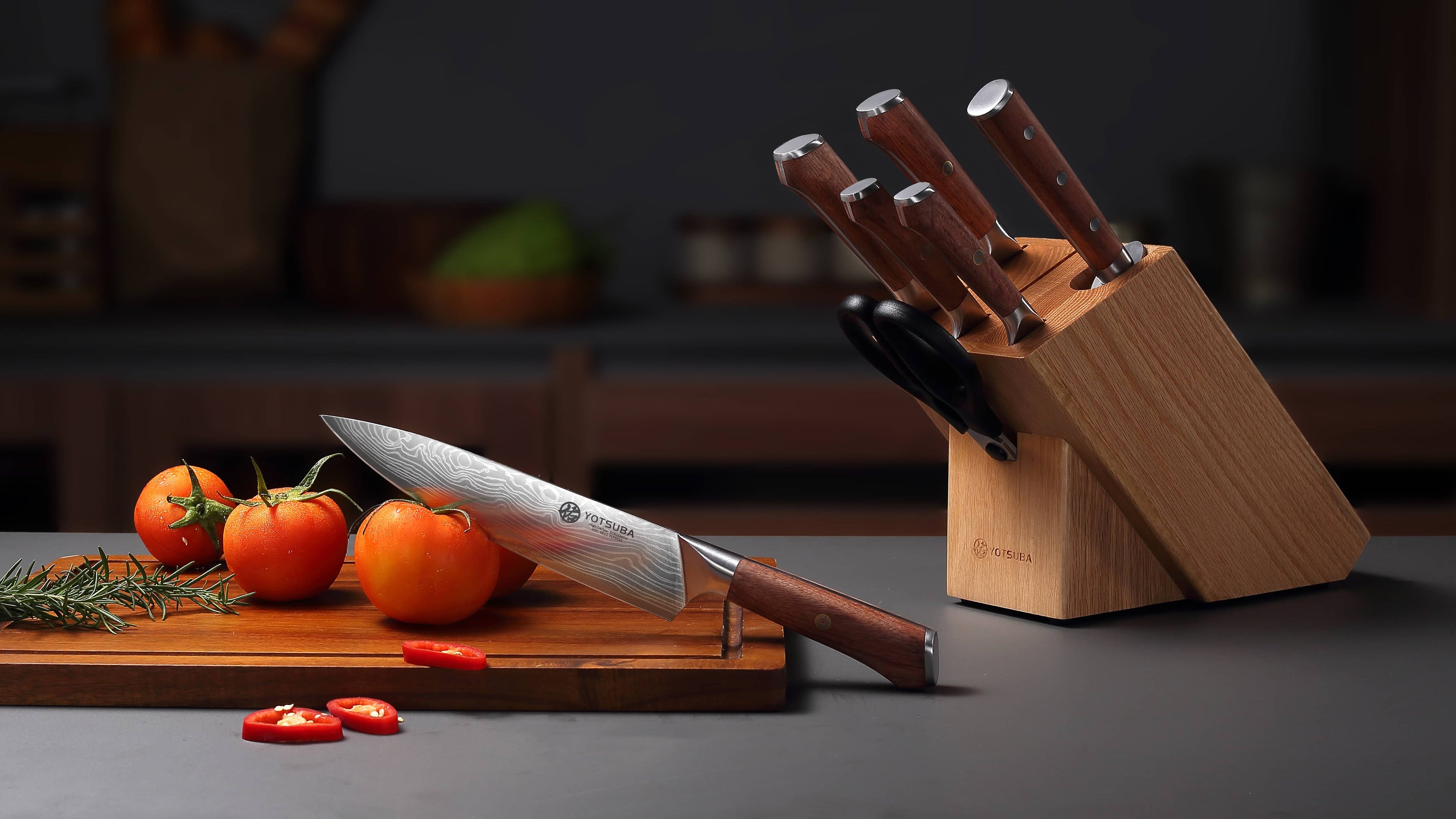 Professional chef sharpening Yotsuba Japanese kitchen knife in modern kitchenslider_item_exxrim